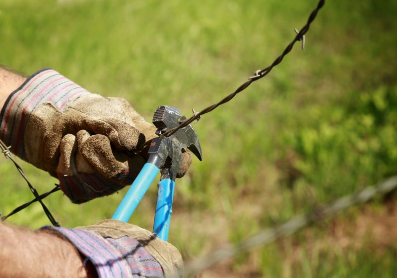 Local Barbed Wire Fence Installation pros at work